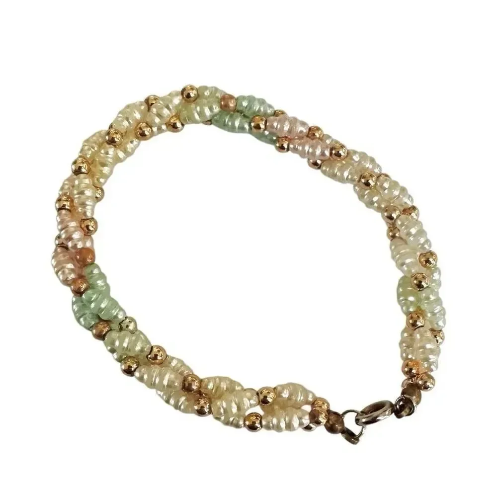 Faux pearl twisted multi strand bracelet